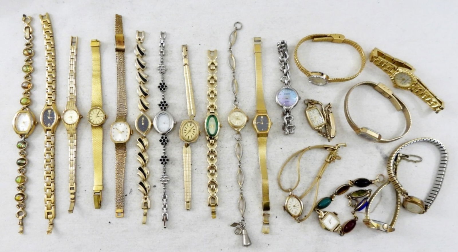 20 Vintage Danity Women's Watches: Dainty Women's Watches Mostly Gold tone, a couple silver. Milan, Pulsar, Marty are just a few of the brands. "NOT TESTED AS TO WORKING OR NOT"