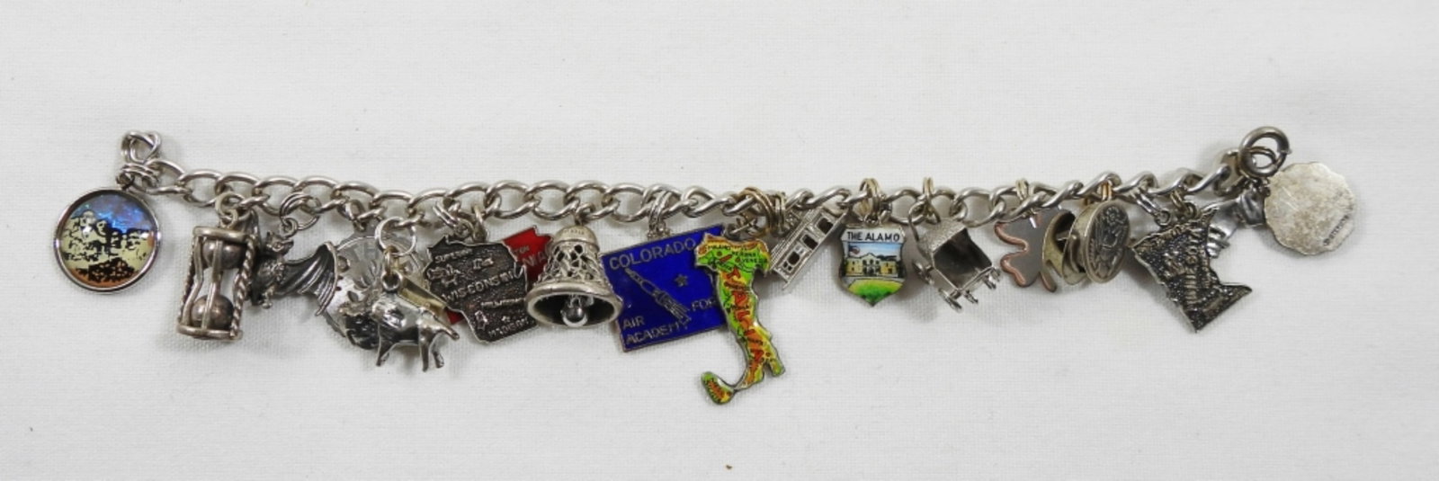 STERLING CHARM BRACELET LOADED: (18) CHARMS of DESTINATIONS & EVENTS - 7" LONG (34 DWT)