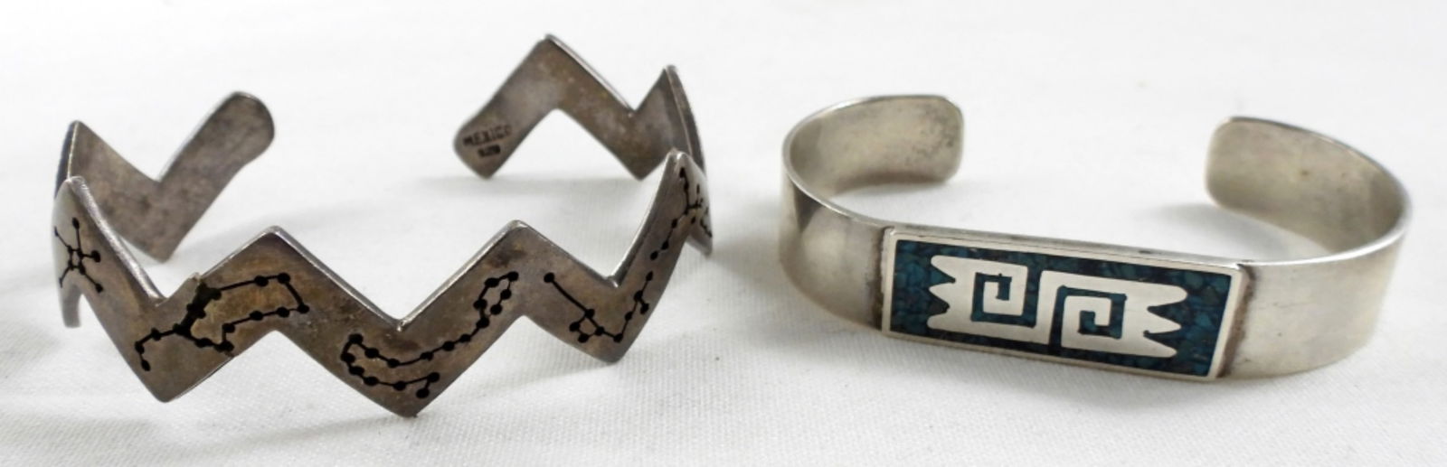 MEXICO 925 CUFF BRACELETS: 32DWT, 1 IS 6 1/2IN AROUND WITH GAP, STAMPED 925 TN-04 MEXICO, CONSTELLATION CUFF (DOES HAVE A CRACK ON CUFF) STAMPED MEXICO 925, NEAR 7IN AROUND WITH GAP