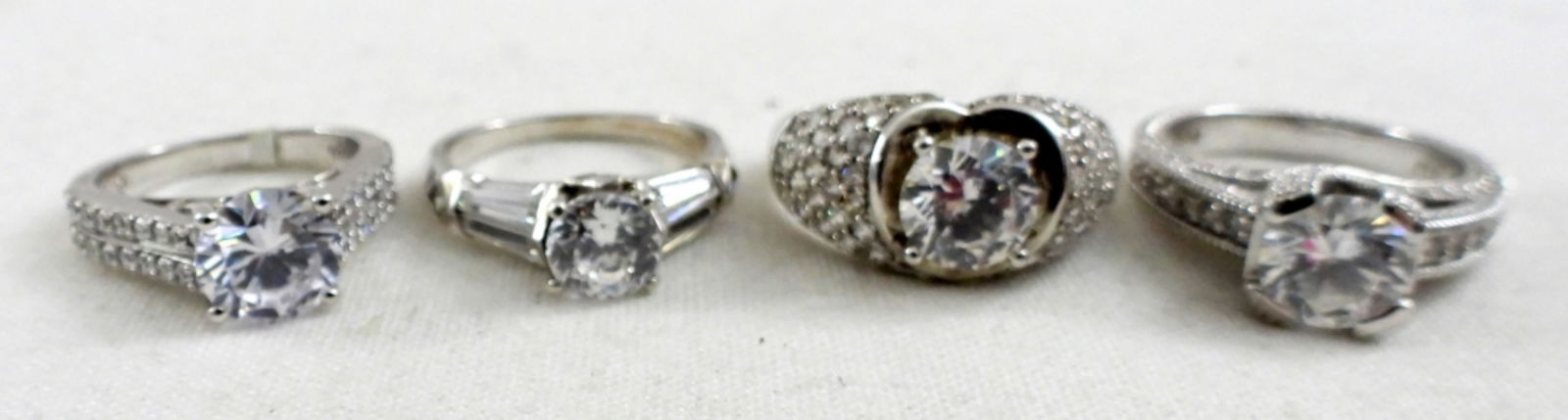 (4) BRIDAL STYLE STERLING RINGS (1 of 2)