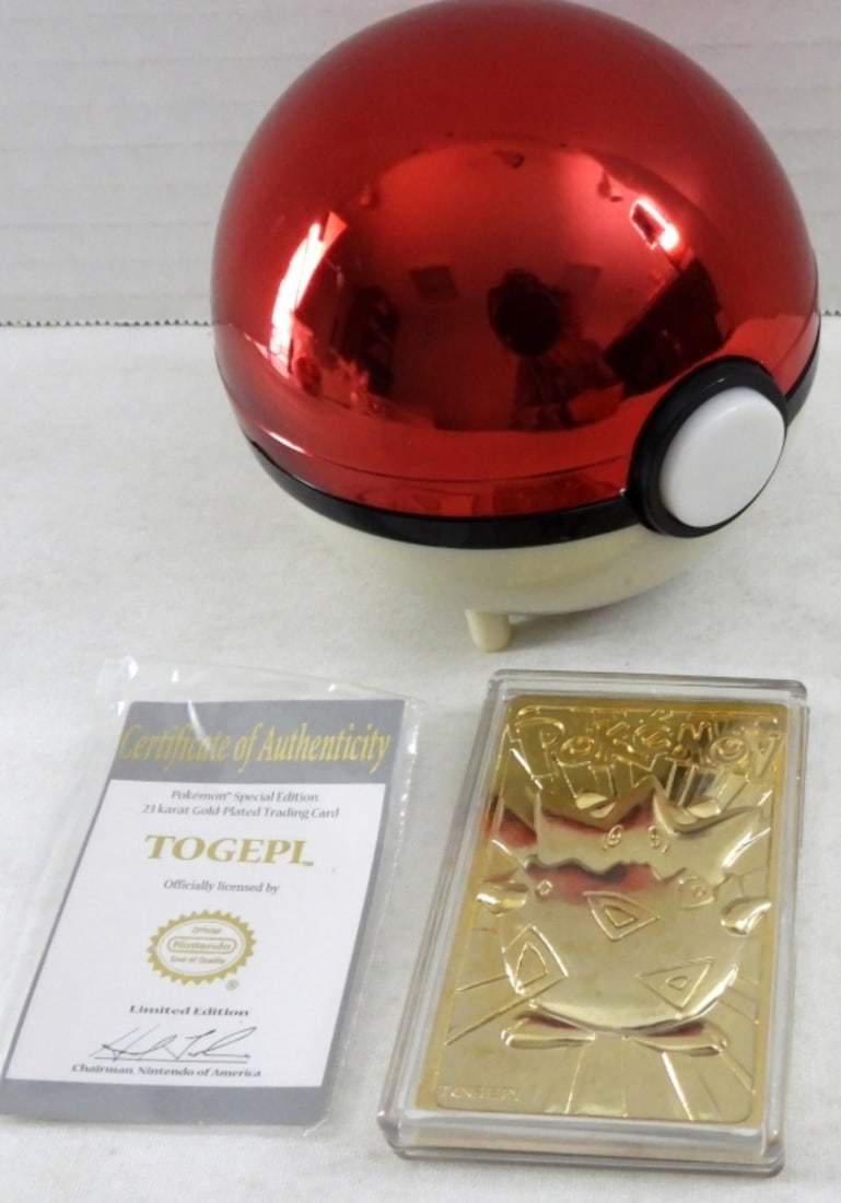TOGEPI POKEMON BALL GOLD BAR CARD: 1999 POKEMON GOLD BAR TOGEPI POKEMON BALL, SLIGHT WEAR ON POKEMON BALL, GOLD CARD AND CERTIFICATE IN ORIGINAL PACKAGING