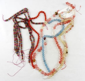 (10) STRANDS OF GEMSTONE BEADS
