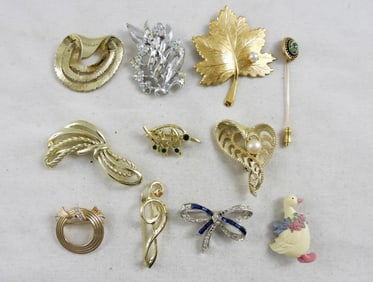 (11) VTG BROOCHES