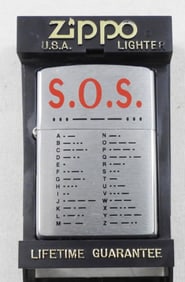 1997 SEALED ZIPPO S.O.S. LIGHTER