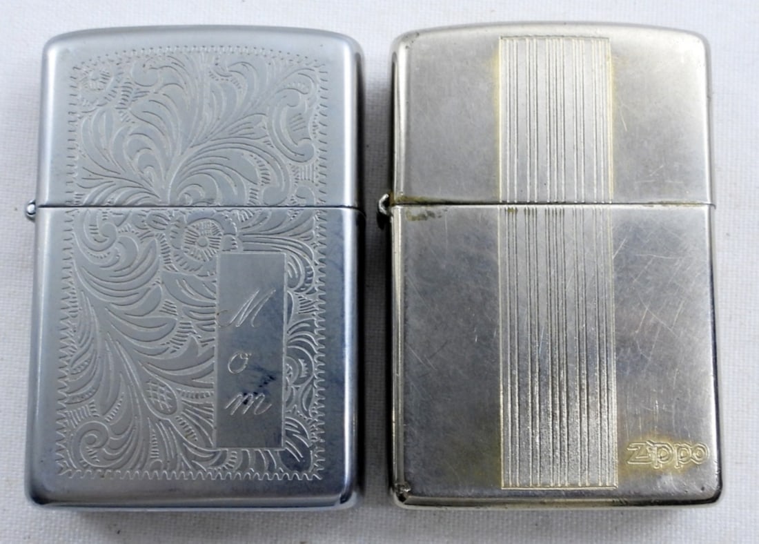 1994 VTG BRASS ZIPPO- 1980 VTG ZIPPO: VINTAGE 1994 WITH LINES DOWN THE CENTER, FIRED. VINTAGE 1980 ZIPPO WITH DESIGN, UNFIRED.