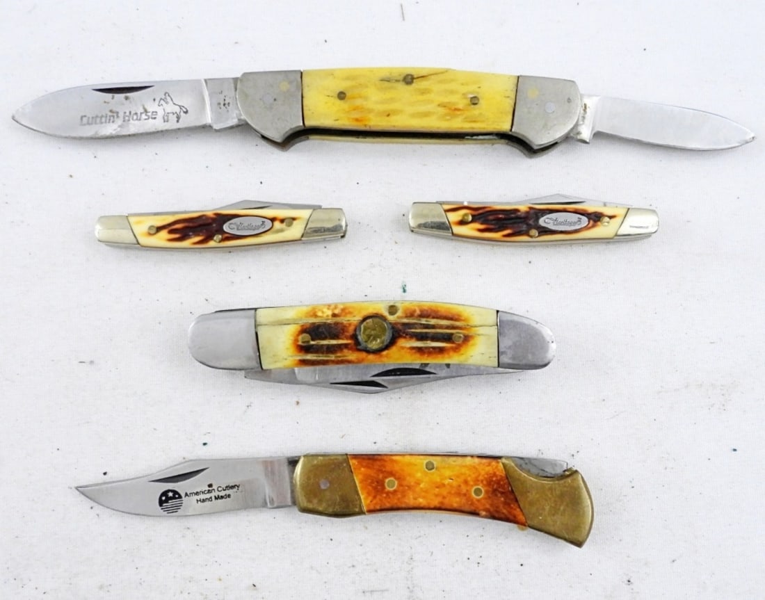 (5) BONE HANDLED POCKET KNIVES: 2- HERITAGE 2' BLADED POCKET KNIVES IN NICE CONDITION, 1 WILD TURKEY HAND MADE SOLINGEN STEEL DOUBLE BLADED POCKET KNIFE, 2 DOUBLE BLADED BONE HANDLED POCKET KNIVES. ALL IN GOOD CONDITION, PRE OWNED.