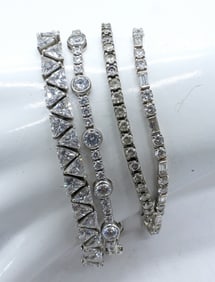 (4) CLEAR STONE STERLING BRACLETES