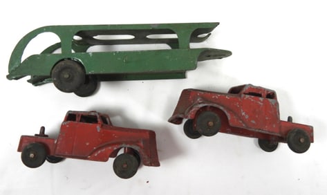 (2) METAL TRUCKS (1) CAR HAULER