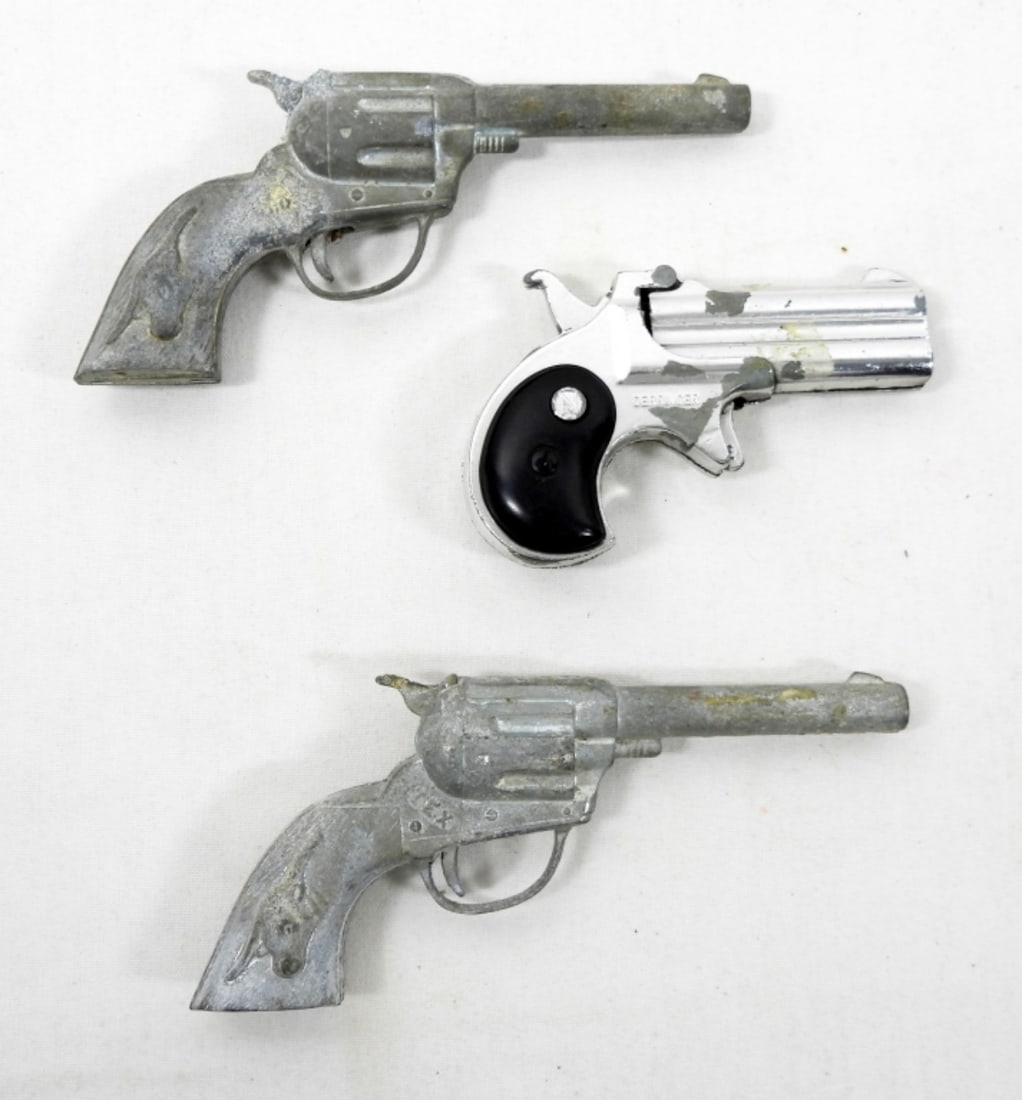 (3) VINTAGE CAP GUNS: (3) VINTAGE CAP GUNS (2) HUBLEY TEX CAP GUNS &1 DERRINGER CAP GUN