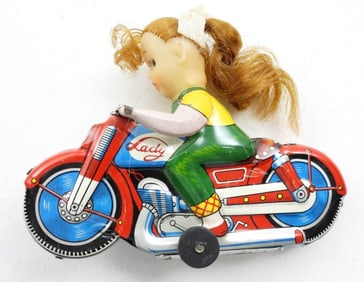 VINTAGE HAJI FRICTION GIRL CYCLE IN BOX