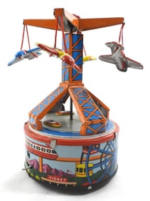1960'S WIND UP CARNIVAL IN ITSELF TIN TOY