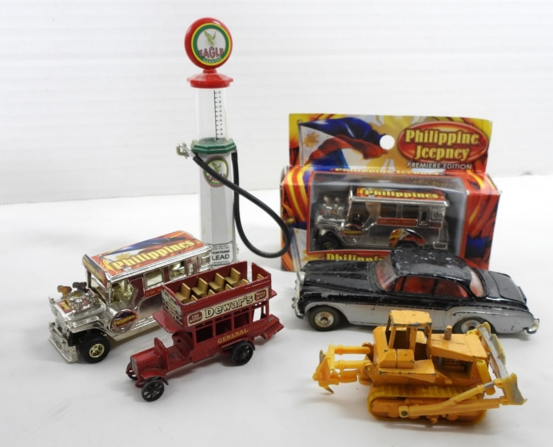 MIXED LOT OF TOY CARS: 1912-1920 DEWAR'S LESNEY IN GOOD CONDITION. 2 PHILIPPINE JEEPNEY PREMIERE EDITION- ONE IS IN THE ORIGINAL PACKAGING, THE OTHER HAS NO BOX DOES SHOW SOME WEAR. CORCI TOYS BENTLEY CONTINENTAL IN FAIR TO