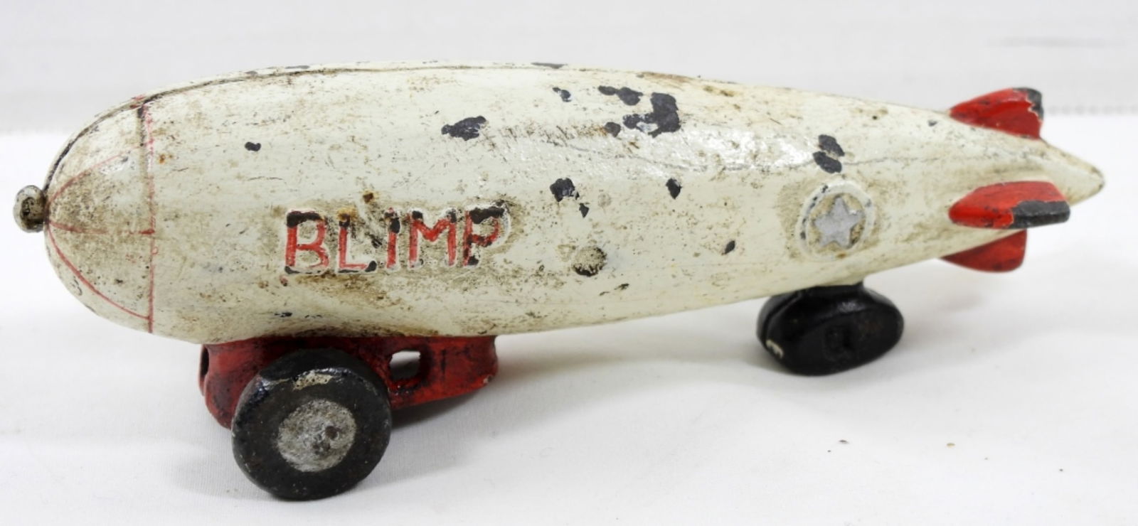 CAST IRON "BLIMP" PULL TOY - ANTIQUE (1 of 2)