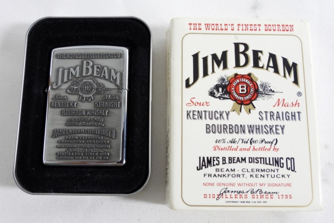 VTG JIM BEAM ZIPPO- 1997: VINTAGE 1997 JEAM BEAM INSPIRED ZIPPO- ENGRAVING ON THE BACK "EVERY TIME OUR EYES MEET MIN TELL YOURSâ€¦" UNFIRED. IN GOOD CONDITION- THIS ZIPPO HAS THE TIN ZIPPO BOX, AND A CARDBOARD JIM BEAM 