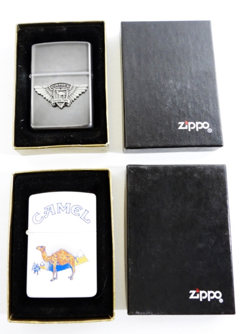 (2) UNSTRUCK ZIPPO "CAMEL" LIGHTERS: BOTH HAVE SEALS that are broke - BUT UNSTRUCK in BOXES
