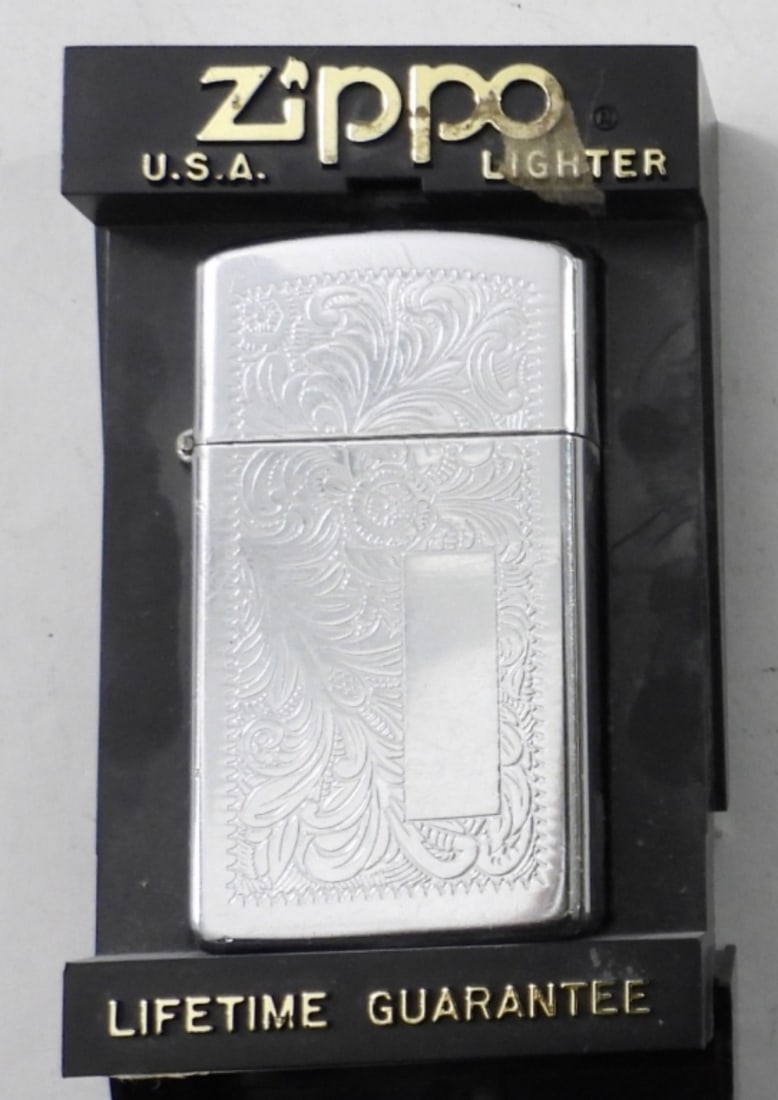 1991 FIRED SLIM VENETIAN ZIPPO LIGHTER: 1991 FIRED SLIM CHROME VENETIAN ZIPPO LIGHTER IN ORIGINAL BOX. MODEL #1652