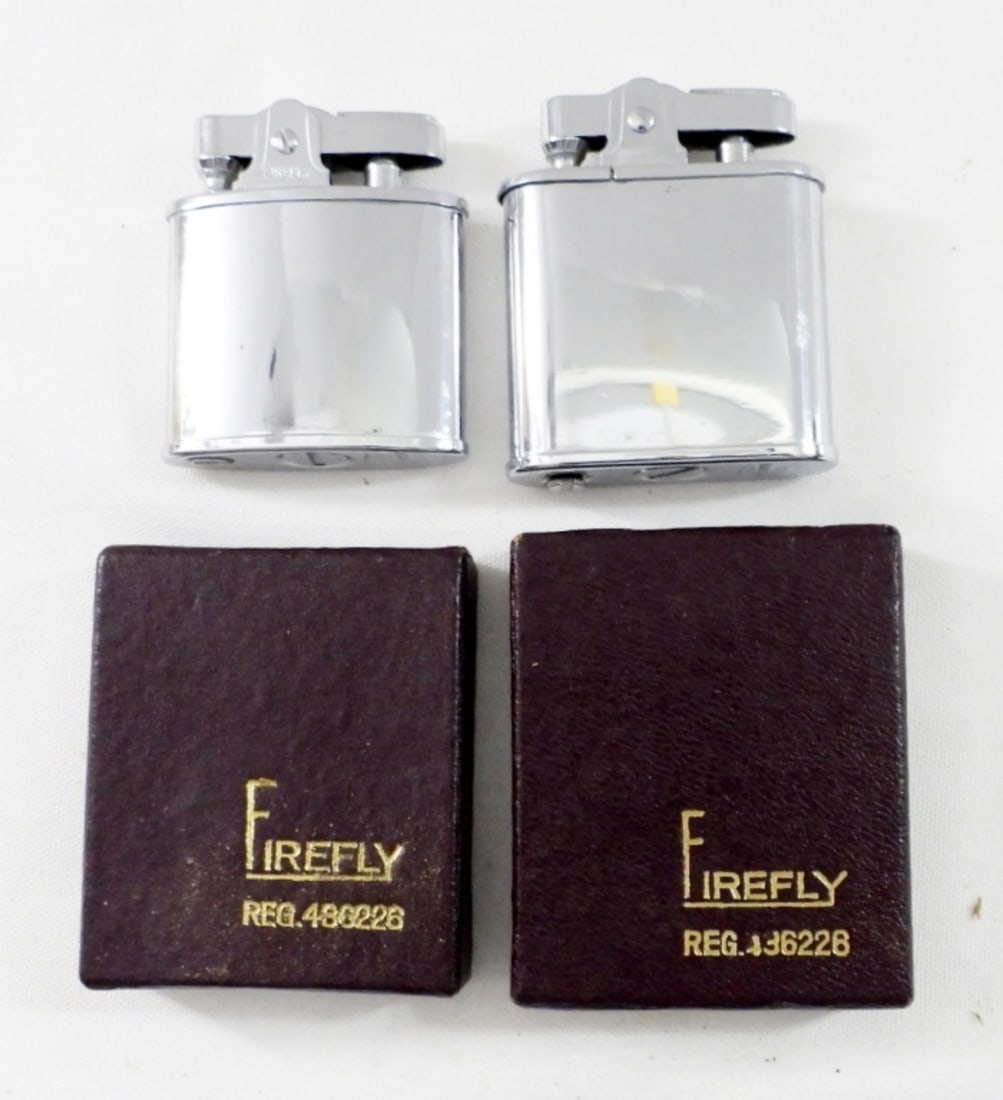 (2) FIREFLY VINTAGE LIGHTERS & ORIG. BOX: (2) FIREFLY VINTAGE LIGHTERS & ORIG. BOX SILVER TONE STILL IN TISSUE GOOD CONDITION