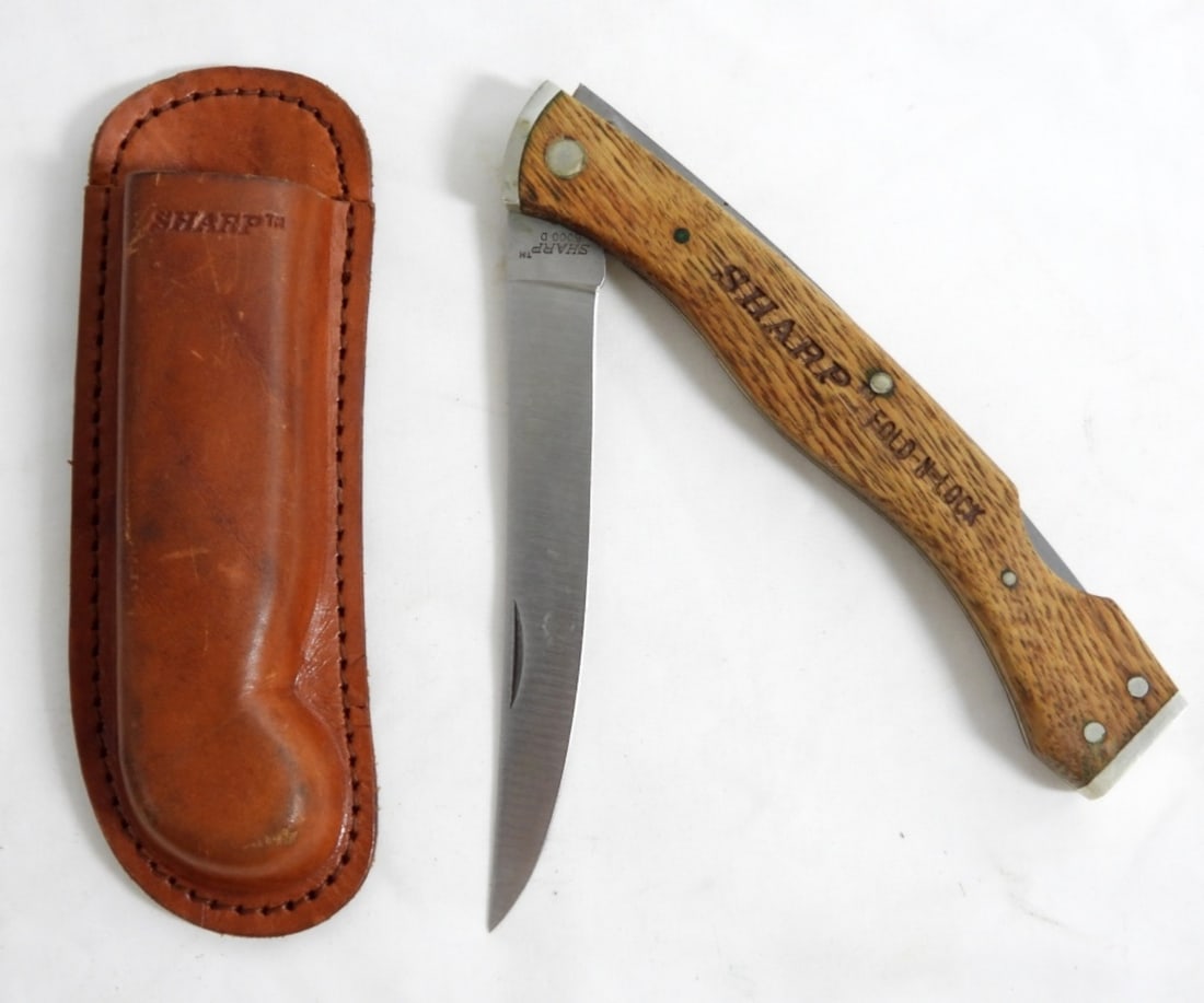 VINTAGE SHARP FOLD-N-LOCK 5000 D KNIFE: VINTAGE SHARP FOLD-N-LOCK 5000 D IN ORIGINAL SHEATH, MADE IN JAPAN, GOOD CONDITION