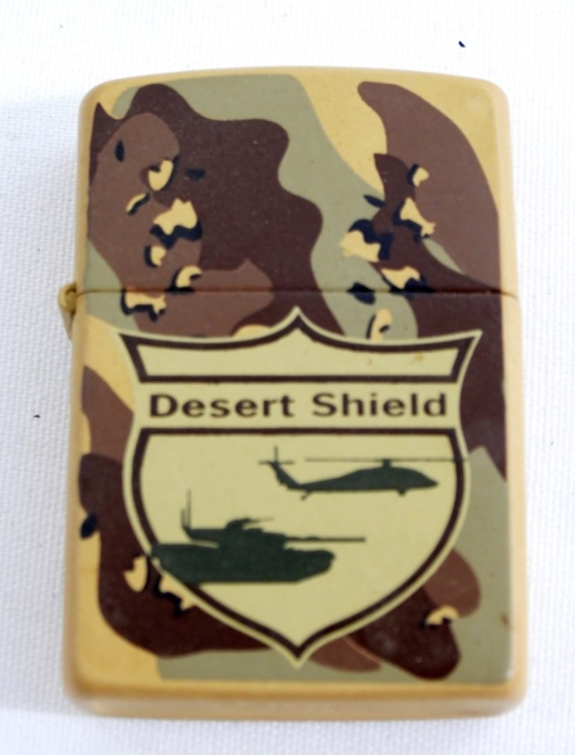 1994 CAMO DESERT SHIELD ZIPPO: 1994 DESERT SHIELD ZIPPO IN GOOD CONDITION- UNFIRED-PREOWNED.