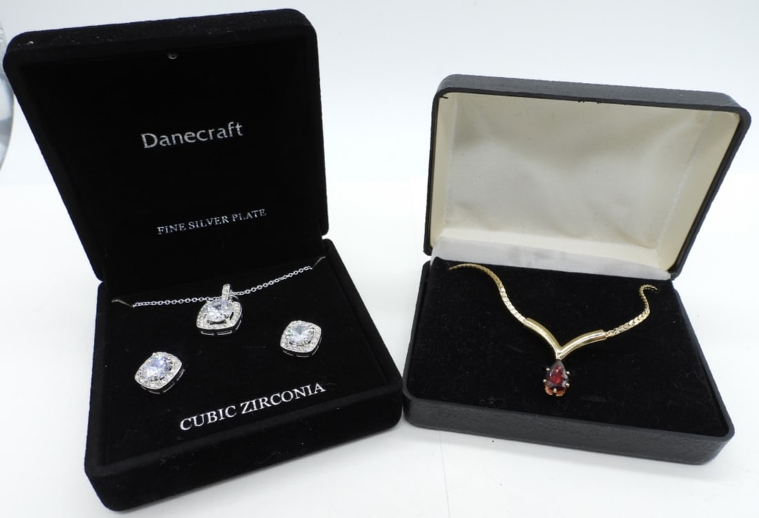 DANECRAFT CZ SET & GARNET NECKLACE: DANECRAFT "FINE SILVER PLATE, CUBIC ZIRCONIA" NECKLACE & PIERCED EARRINGS (IN A REALLY COOL BOX). ONE GOLD TONE FASHION NECKLACE WITH A GARNET GEMSTONE, INCLUDES GARNET COA.