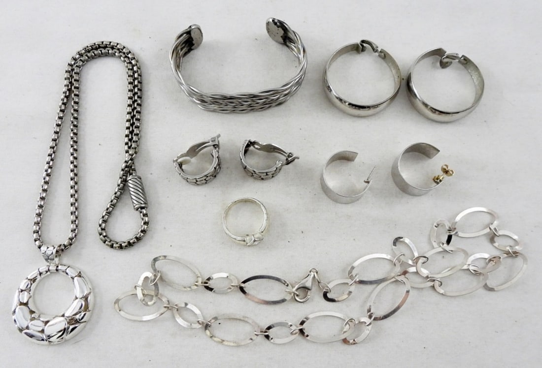 SILVER TONE JEWELRY LOT (7 PIECES): 2 16IN NECKLACES, 3 EARRINGS, 1 RING (8.5 SIZE), AND 1 CUFF BRACELET