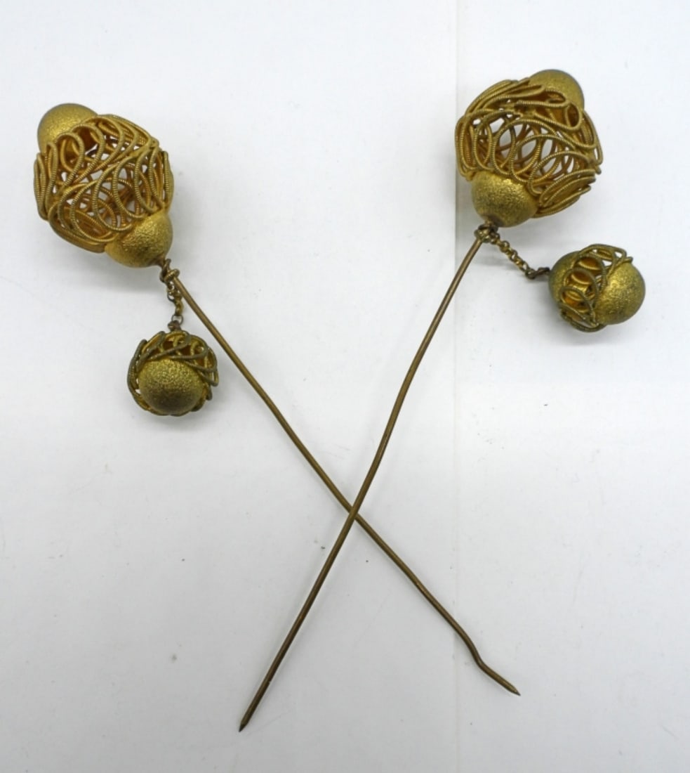 (2) VTG GOLD COLOR HAT PINS: TWO VINTAGE GOLD COLORED HAT PINS. 6" LONG.