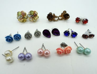 26 PAIR OF PIERCED STUD EARRINGS