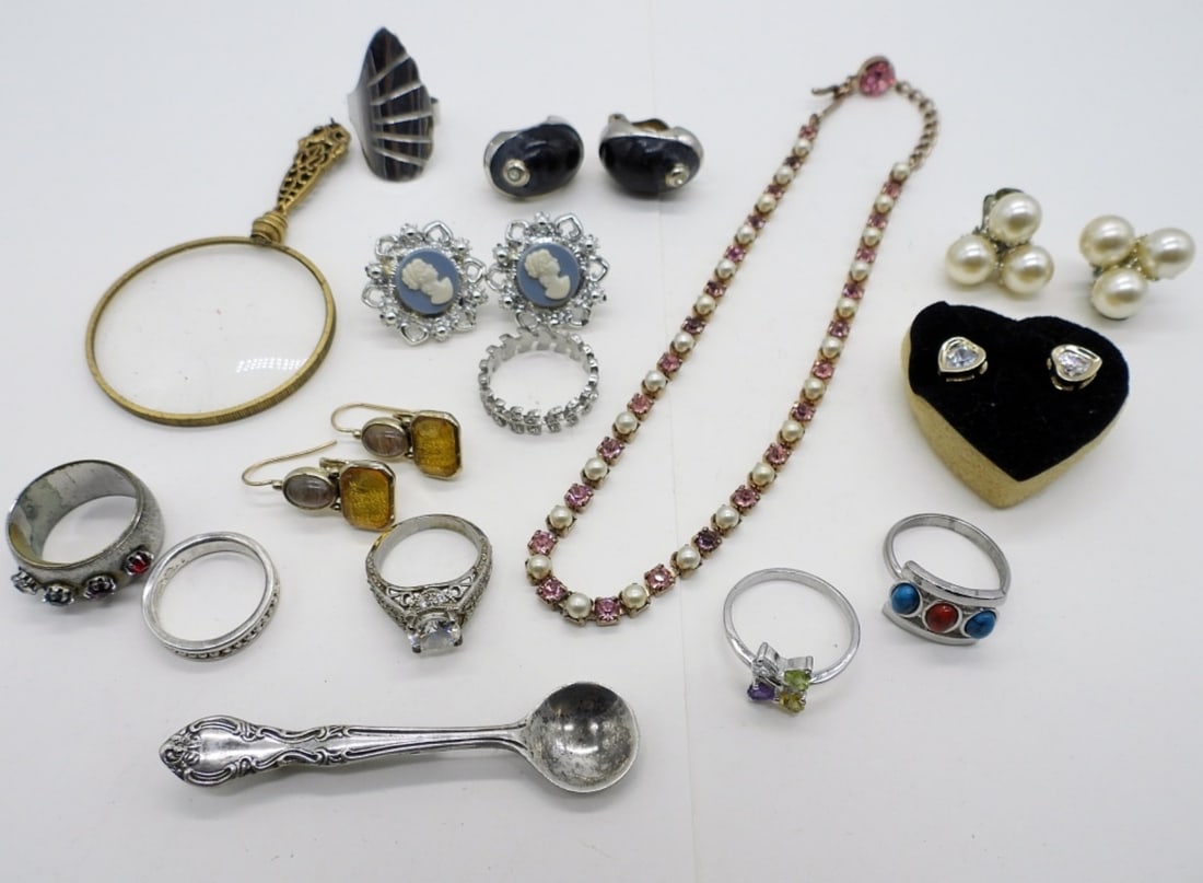 RINGS, EARRINGS, MISC JEWELRY: 7 RINGS, SIZE 6-9. FIVE PAIR OF EARRINGS. PIERCED & CLIP ON. 14" PINK NECKLACE. SPOON PIN AND MAGNIFYING GLASS PENDANT.