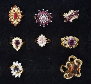 (8) GOLD TONE FASHION RINGS
