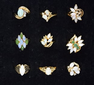 (9) OPAL GOLD TONE RINGS