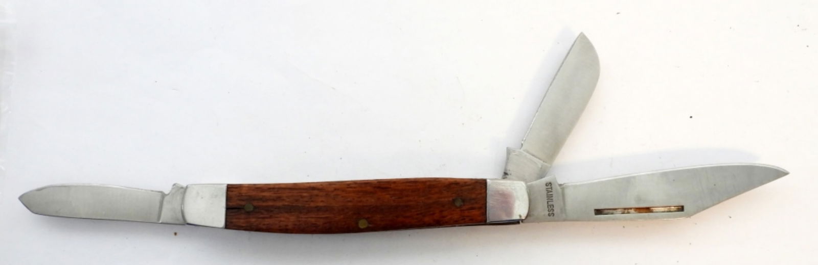 3 BLADE STAINLESS STEEL POCKET KNIFE: 3 BLADE STAINLESS STEEL POCKET KNIFE. WOOD HANDLE 9 1/2 " OPEN