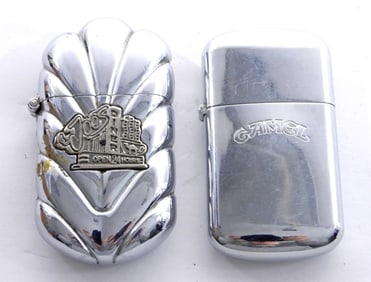 (2) CAMEL-SILVER TONED- LIGHTERS