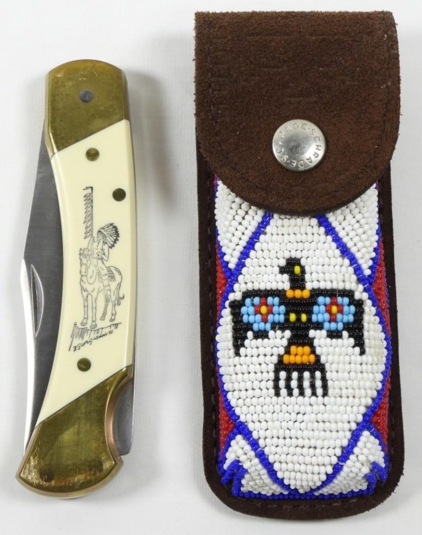SCHRADE THUNDERBIRD SCRIMSHAW KNIFE SET: VINTAGE SCHRADE KNIFE SET: THUNDERBIRD IMAGERY TB FOLDING KNIFE WITH LEATHER BEADED SHEATH, IN ORIGINAL PACKAGING. LIMITED EDITION SET.