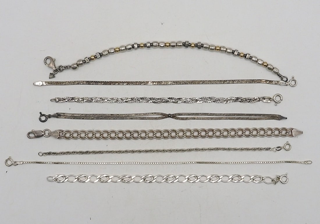 (8) STERLING CHAIN BRACELETS: 7-9" STERLING CHAIN BRACELETS. (25.9 DWT)