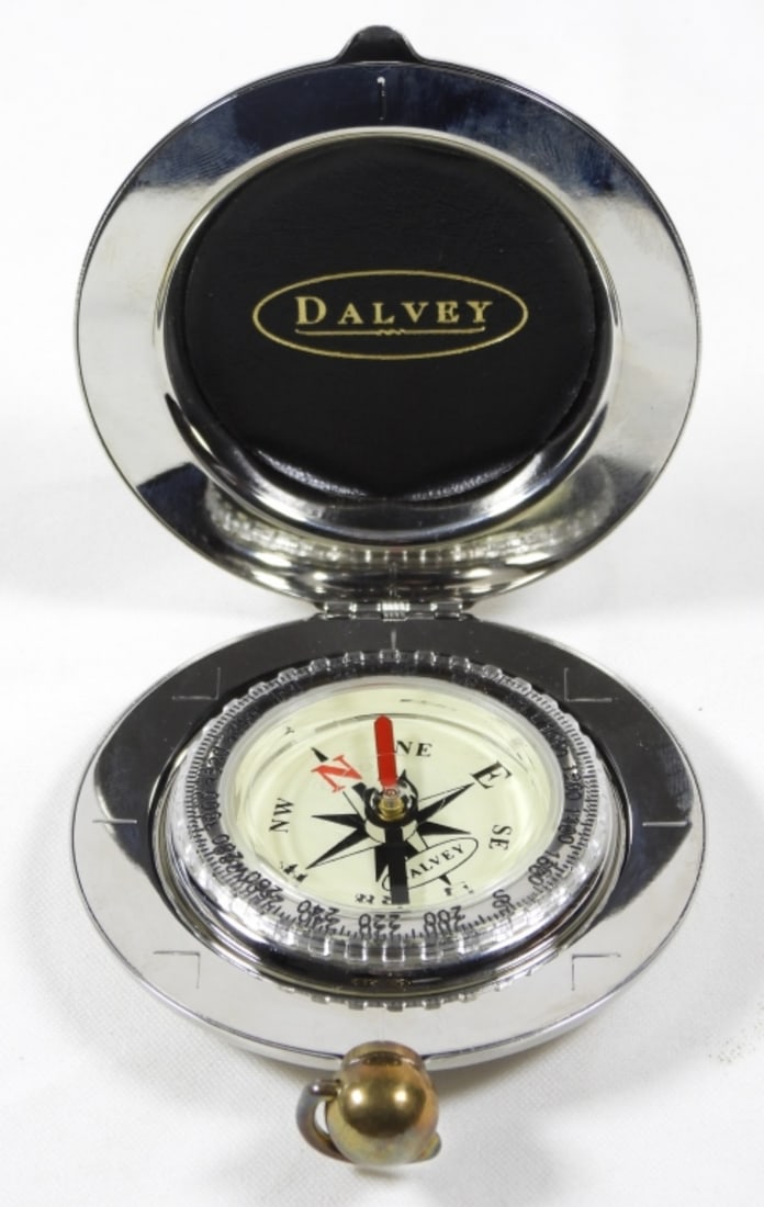 DALVEY POCKET COMPASS: STIL IN ORIGINAL BOX, WITH INSTRUCTIONS, ETCHED CONNEXUS ENERGY ON THE FRONT, IN GOOD CONDITION