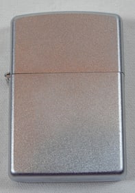 2005 SEALED DESIGNED ZIPPO