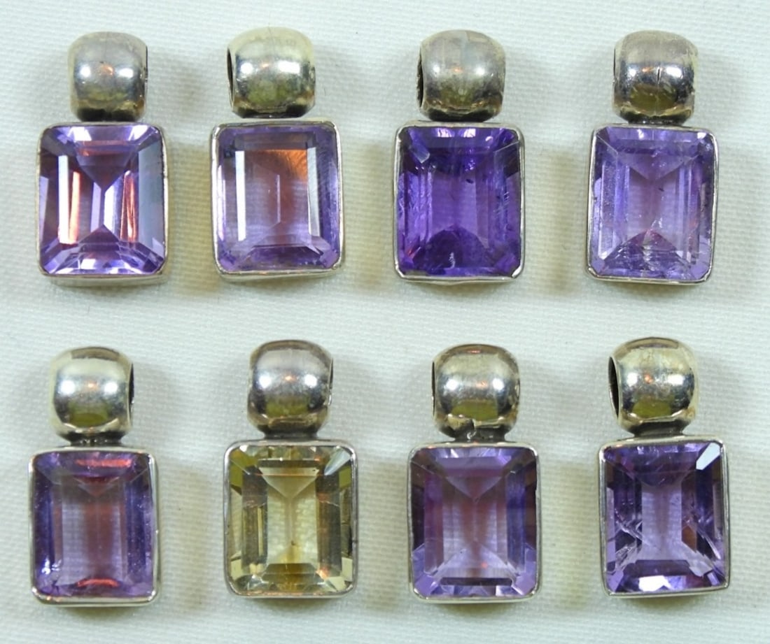 (8)AMETHYST & CITRINE 925 PENDANTS: EIGHT AMETHYST AND CITRINE STERLING PENDANTS. 1" TALL. (16 DWT)