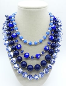(4) BLUE BEADED NECKLACES