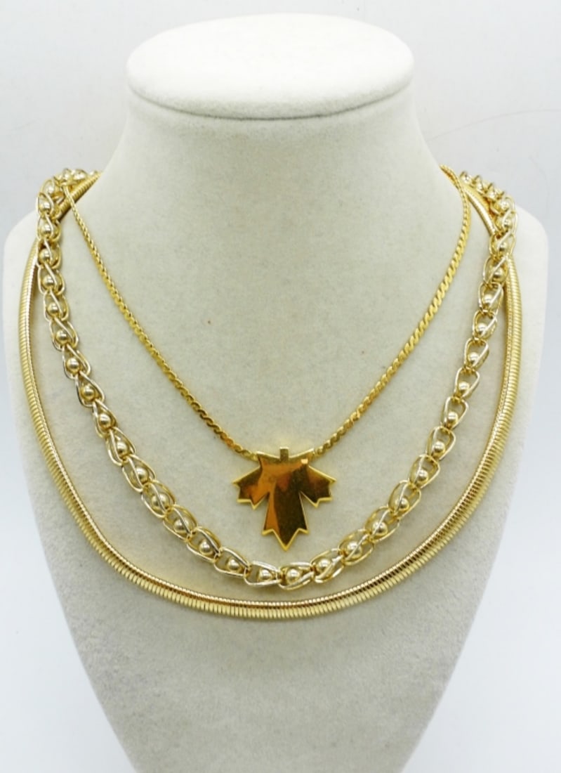 VTG TRIFARI MAPLE LEAF NECKLACE & MORE: THREE GOLD TONE FASHION NECKLACES. TRIFARI MAPLE LEAF, 16". OTHER TWO GOLD TONE NECKLACES, 19" & 24".