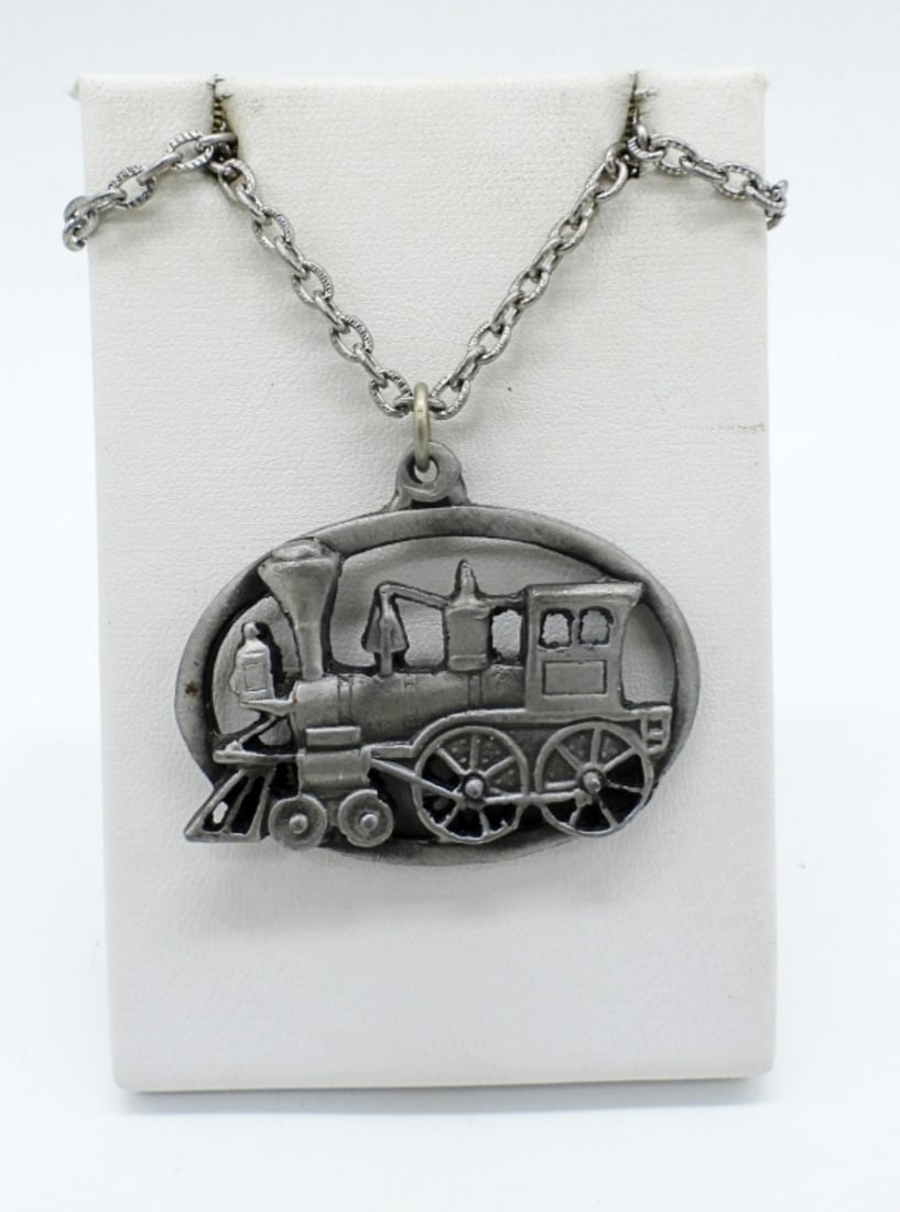 PEWTER LOCOMOTIVE NECKLACE: PEWTER LOCOMOTIVE NECKLACE, 24" CHAIN. PENDANT IS 2" WIDE.