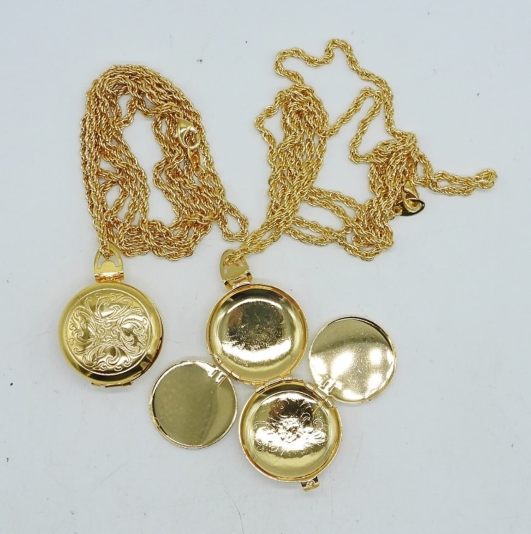2 AVON FOUR PICTURE LOCKETS (1 of 1)