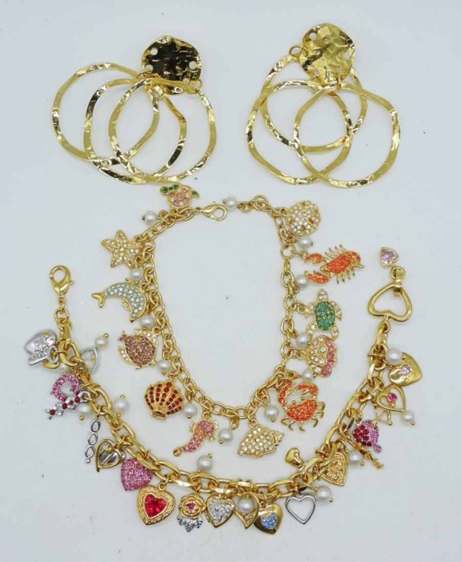 CUTE GOLD TONE CHARM BRACELETS: TWO CUTE GOLD TONE CHARM BRACELETS 8". LOVE THEME & BEACH THEME. GOLD TONE SAND DOLLAR PIERCED EARRINGS.