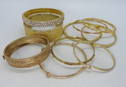 10 GOLD TONE BANGLE BRACELETS