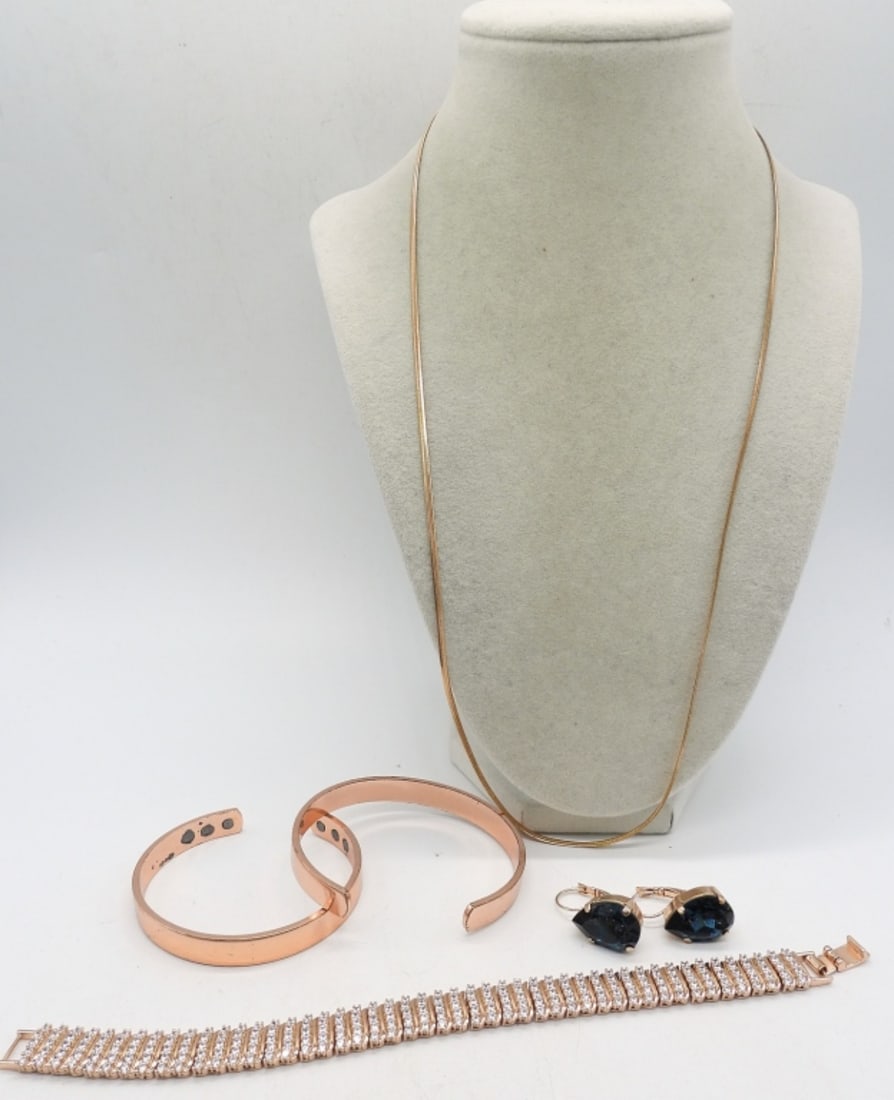 ROSE GOLD TONE BRACELETS & MORE: THREE ROSE GOLD TONED BRACELETS 7-8". VERY PRETTY BLUE / ROSE GOLD TONE PIERCED EARRINGS. ONE ROSE GOLD TONE CHAIN, 24".