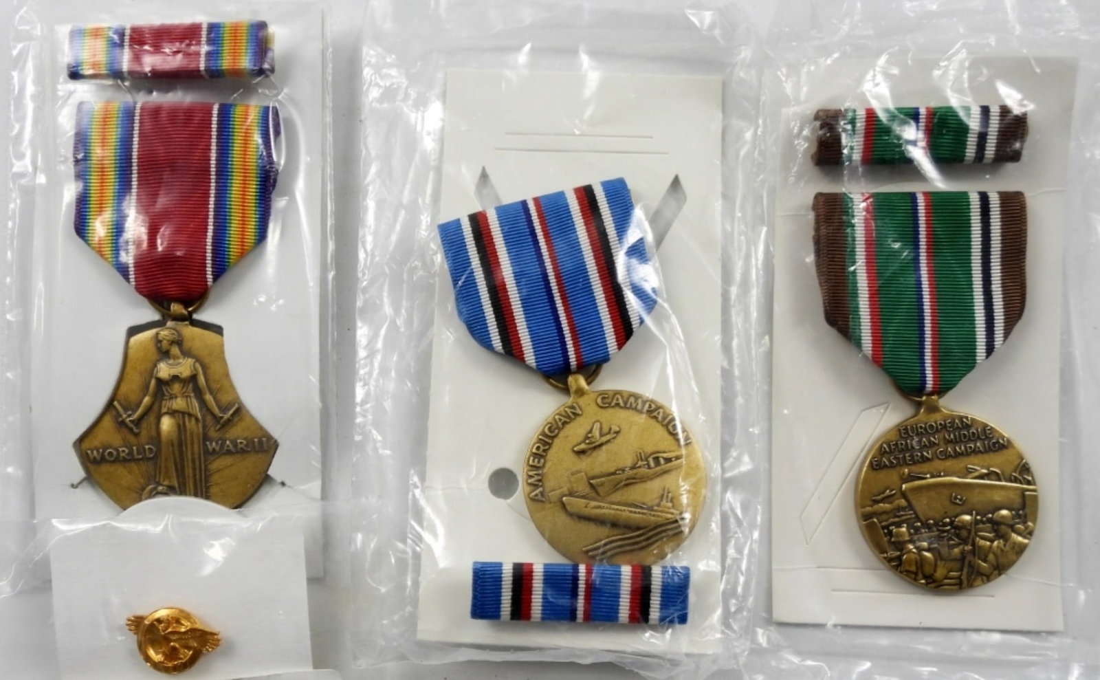 (3) MILITARY RIBBONS: WWII FREEDOM,: EASTERN CAMPAIGN & AMERICAN CAMPAIGN - ALL in ORIGINAL PACKAGES plus (1) LAPEL BUTTON
