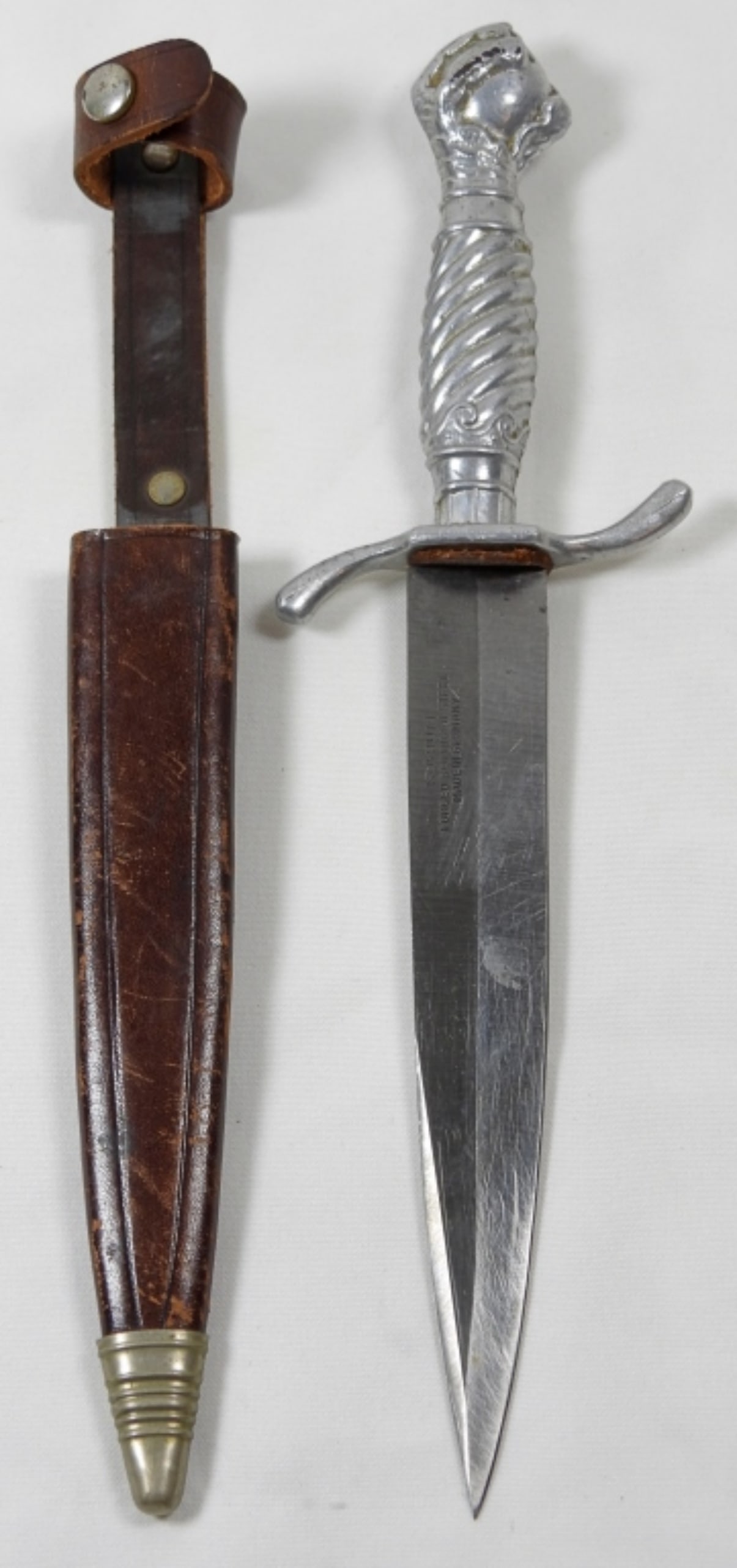 KORIUM DAGGER CLAW & BALL HANDLE: German made Korium dagger claw and ball handle with leather protective cover