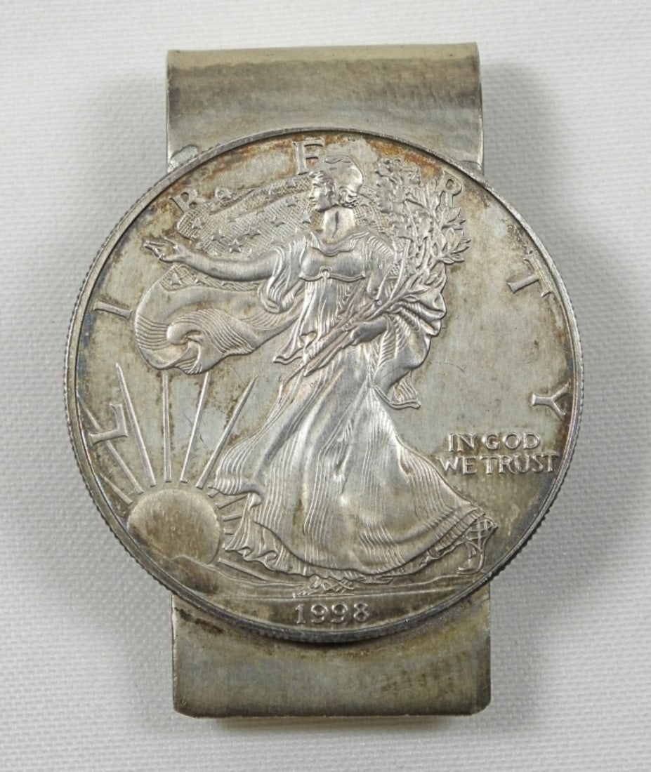 HOUSTON GUN COLLECTORS SILVER DOLLAR MONEY CLIP: HOUSTON GUN COLLECTORS SILVER DOLLAR MONEY CLIP