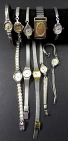 10 SMALL WOMENS SILVER TONE WATCHES