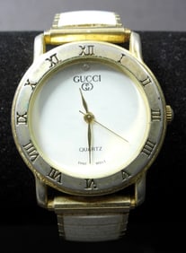 WHITE AND GOLD TONED GUCCI WATCH
