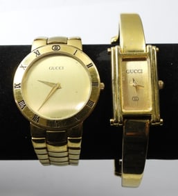 2 GOLD TONED GUCCI WATCHES